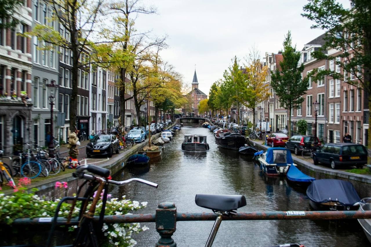 Boats moored along a Jordaan canal